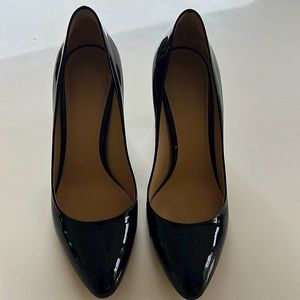 Black patent leather heels.  Worn once.